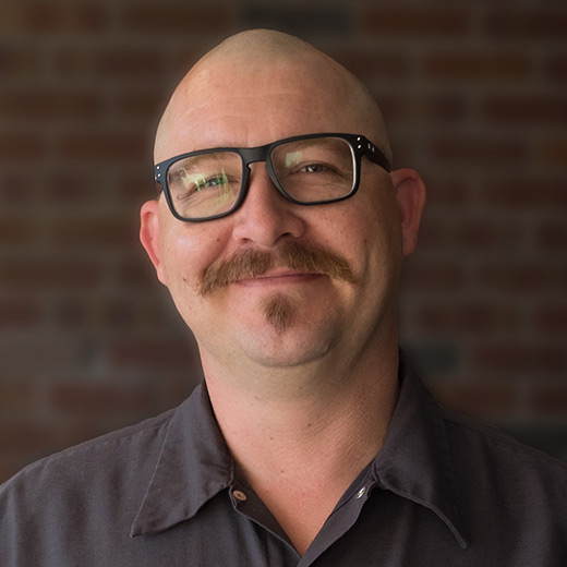 Headshot of Nick Needham
